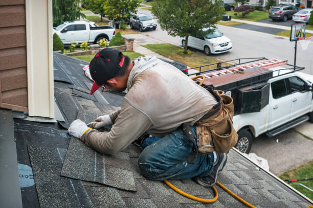 Professional Roofing technician working in Prudence Island, RI